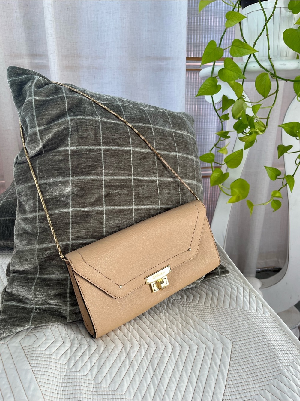 Calvin Klein Beige Crossbody Bag with Gold-Tone Lock